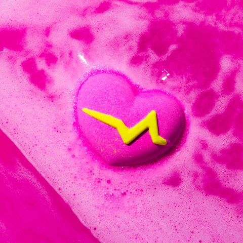 It is a heart shaped bath bomb with surprise in it. When it melt in water, a love note will be concealed.