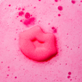 It is a lip shaped bath bomb with surprise in it. When it melt in water, a love note will be concealed.