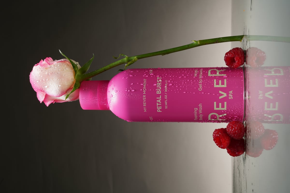 Petal Burst body wash with a rose and fresh raspberries